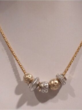 Swarovski If Te Kauri Gold Necklace (never worn)